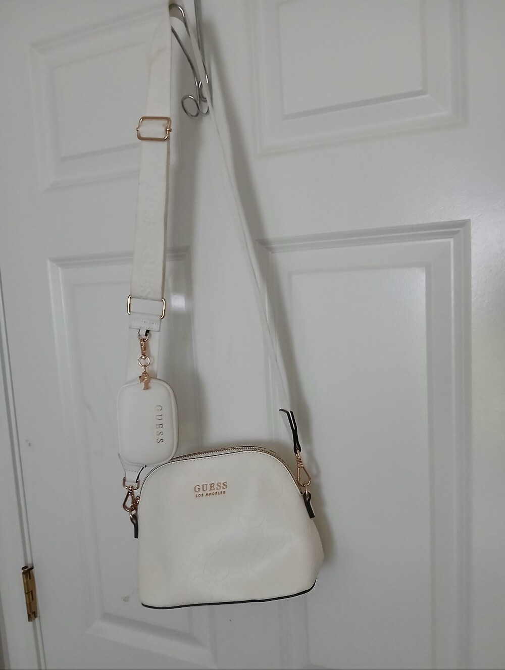 GUESS Off White Crossbody Bag with Detachable Pouch.